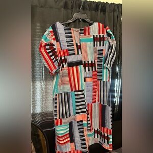 Short sleeved multicolor dress. Very rarely worn. Receive compliments when worn